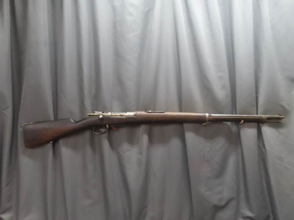 Spanish Model 1893 Mauser rifle, right side profile view showing full stock and barrel