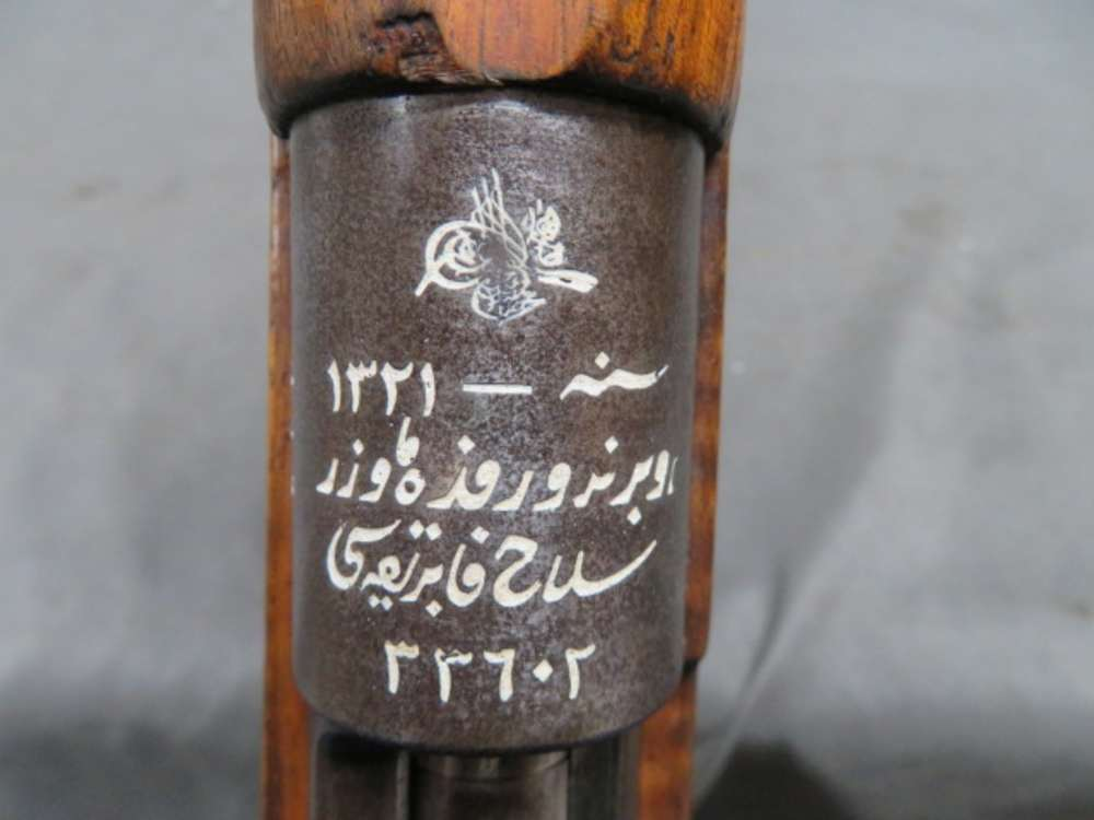 Ottoman Tughra imperial seal engraved on the receiver ring of a Turkish Model 1903 Mauser rifle