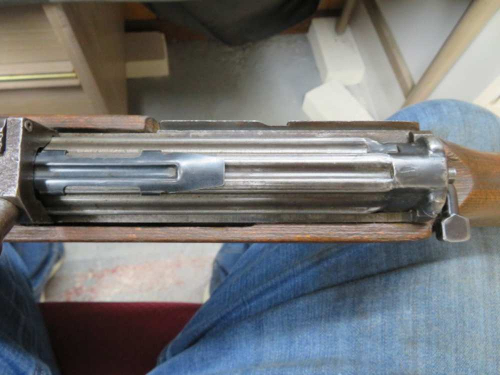 Close-up of the G43's short-stroke gas piston and operating rod assembly beneath the barrel
