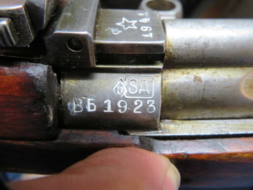 Boxed Finnish SA property stamp on a captured SVT-40 rifle