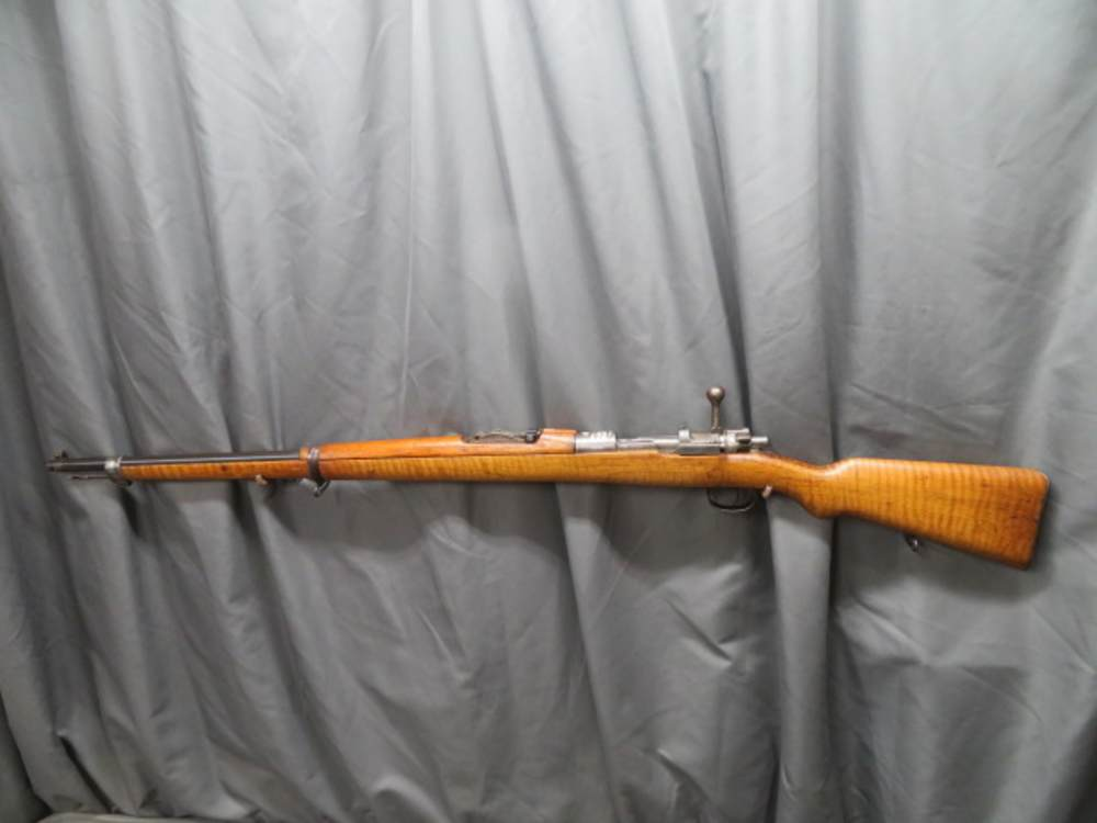 Left side profile of a Turkish Model 1903 Mauser rifle showing the full stock and barrel