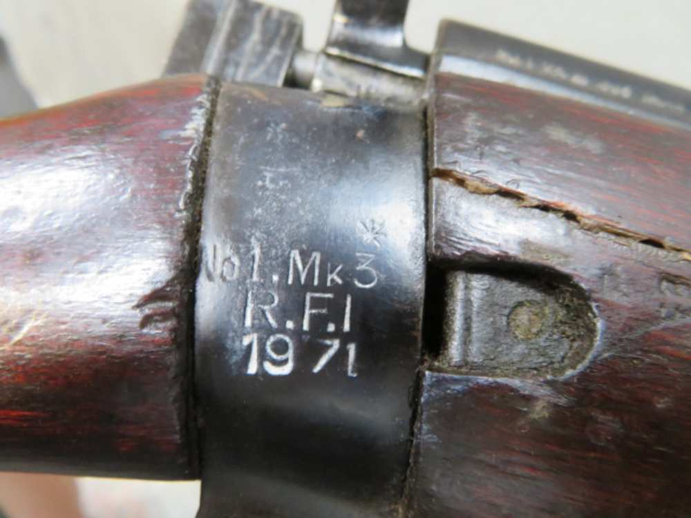 Close-up of Lee-Enfield receiver markings reading No.1 Mk 3, R.F.I, 1971