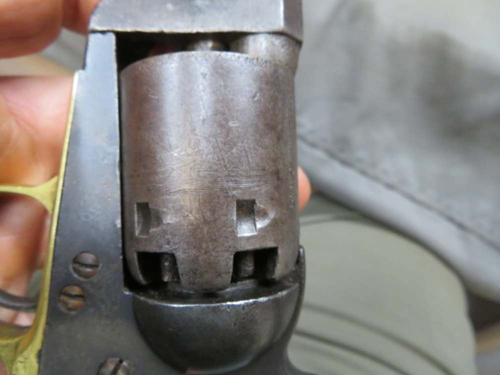 Close-up of the cylinder face showing the safety pins between nipples