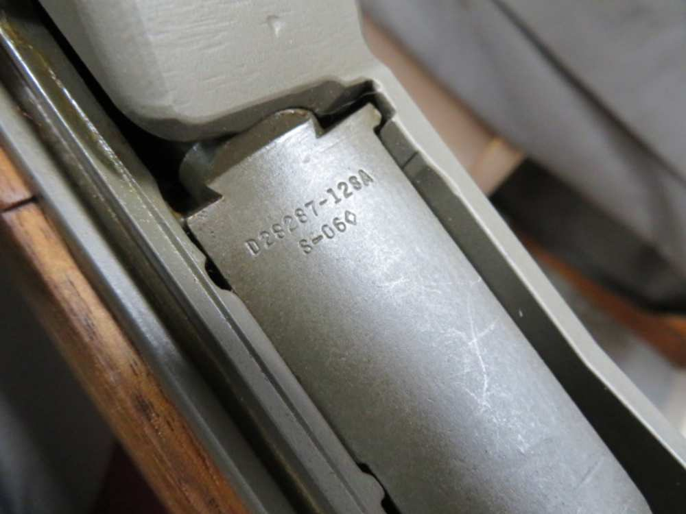 Close-up of M1 Garand bolt part markings