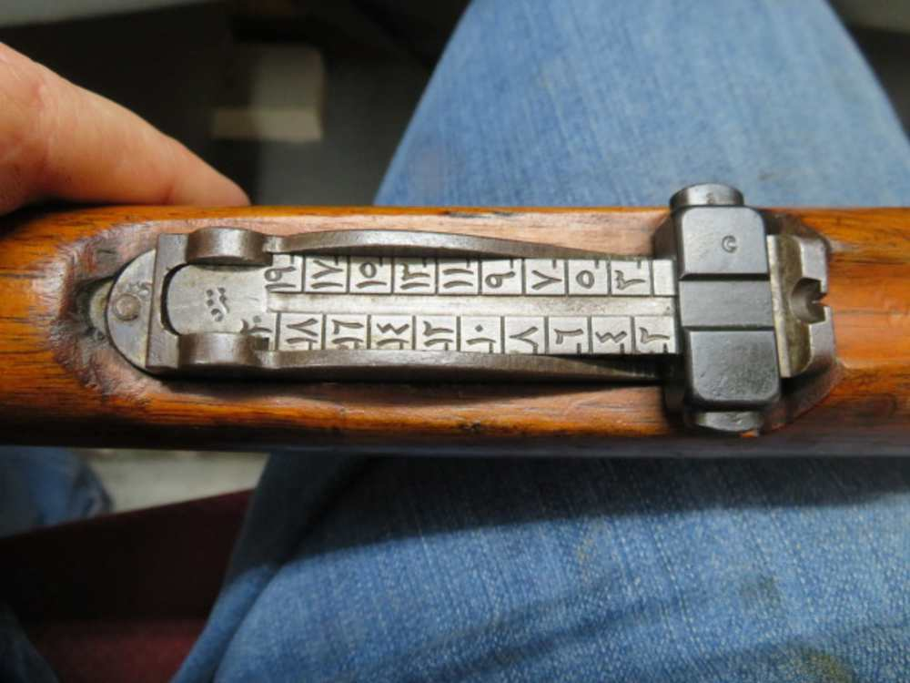 Rear sight of an Ottoman Model 1903 Mauser rifle showing original Ottoman Turkish numeral range graduations