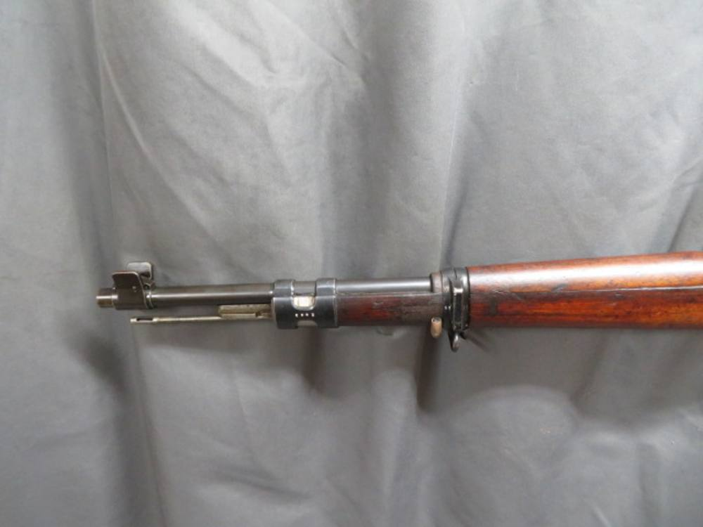 Close-up of the muzzle and front sight assembly of the Portuguese M/937 Mauser rifle