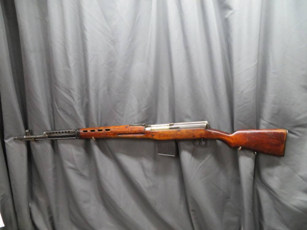 Left side profile of the SVT-40 Tokarev rifle showing the receiver and stock