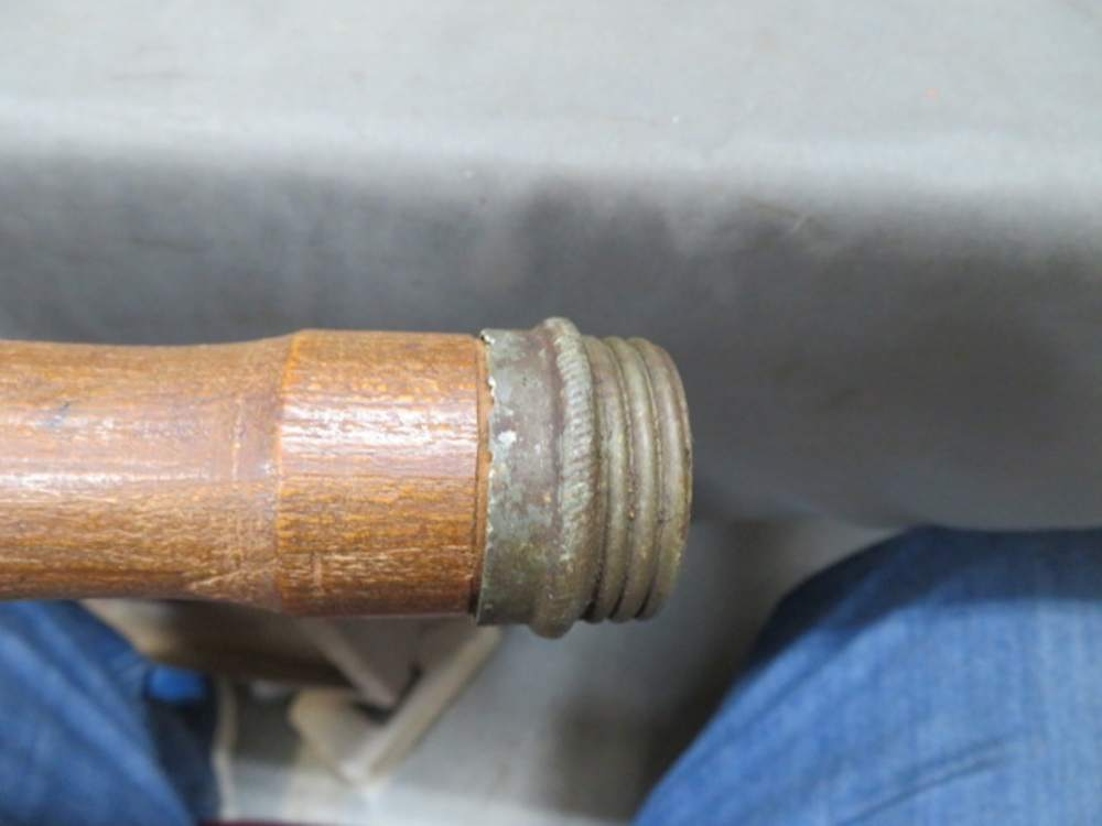 Threaded base cap on the handle of a German Model 1917 stick grenade