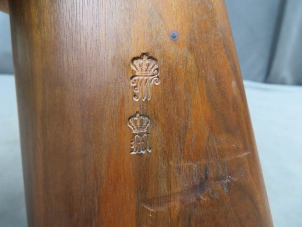 Close-up of imperial crown proof stamps on the stock of the German 71/84 Mauser rifle