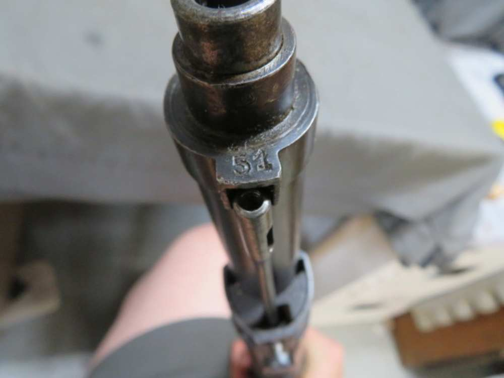 Close-up of a number stamped on the bolt face of the Belgian Mauser carbine