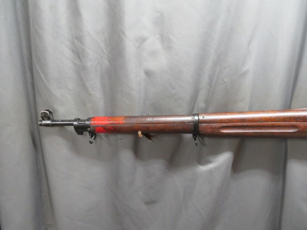 Close-up of the P17 Enfield's muzzle and nose cap with red identification paint