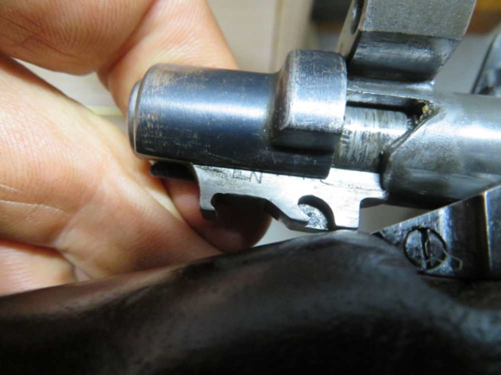 Close-up of the P17 Enfield's bolt handle and takedown markings