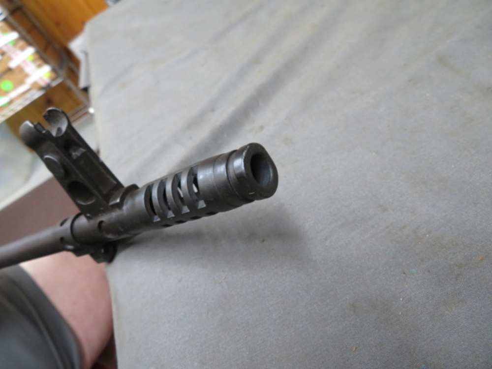 Close-up of the PSL's laminated wood buttstock and cheek rest