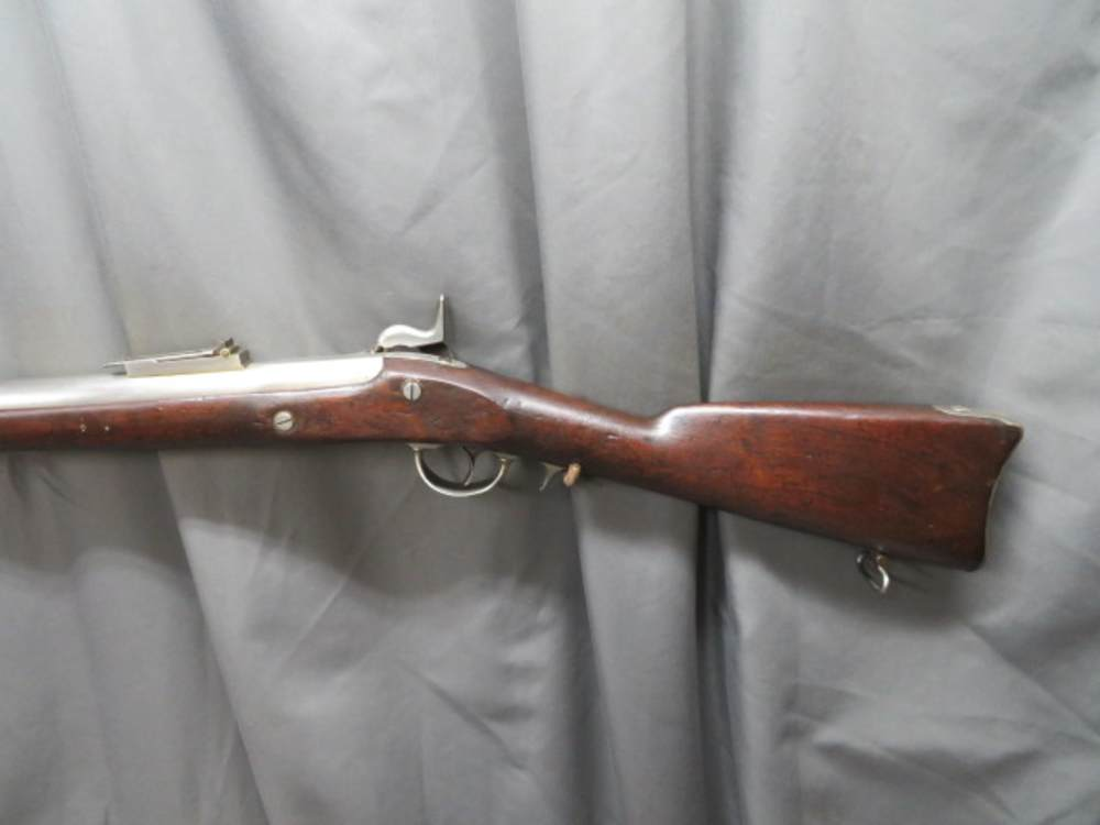 Close-up of the Whitney Plymouth rifle's lock plate and hammer