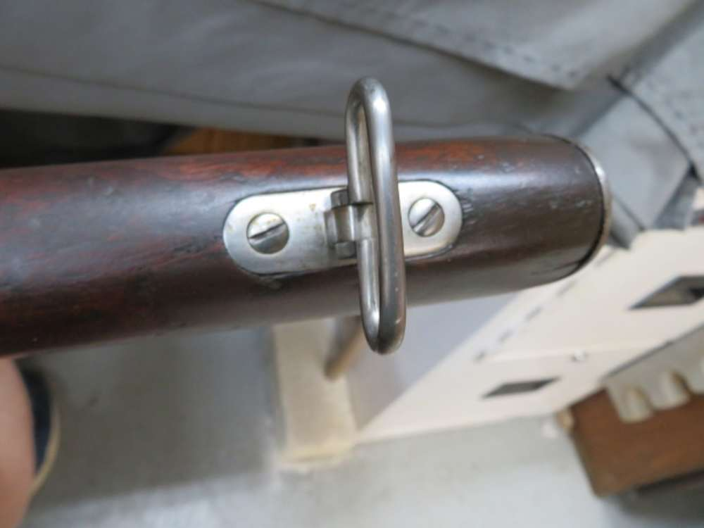 Close-up of a sling swivel band near the muzzle of the Whitney Plymouth rifle